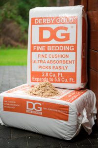 Two bags of shavings used for horse bedding.