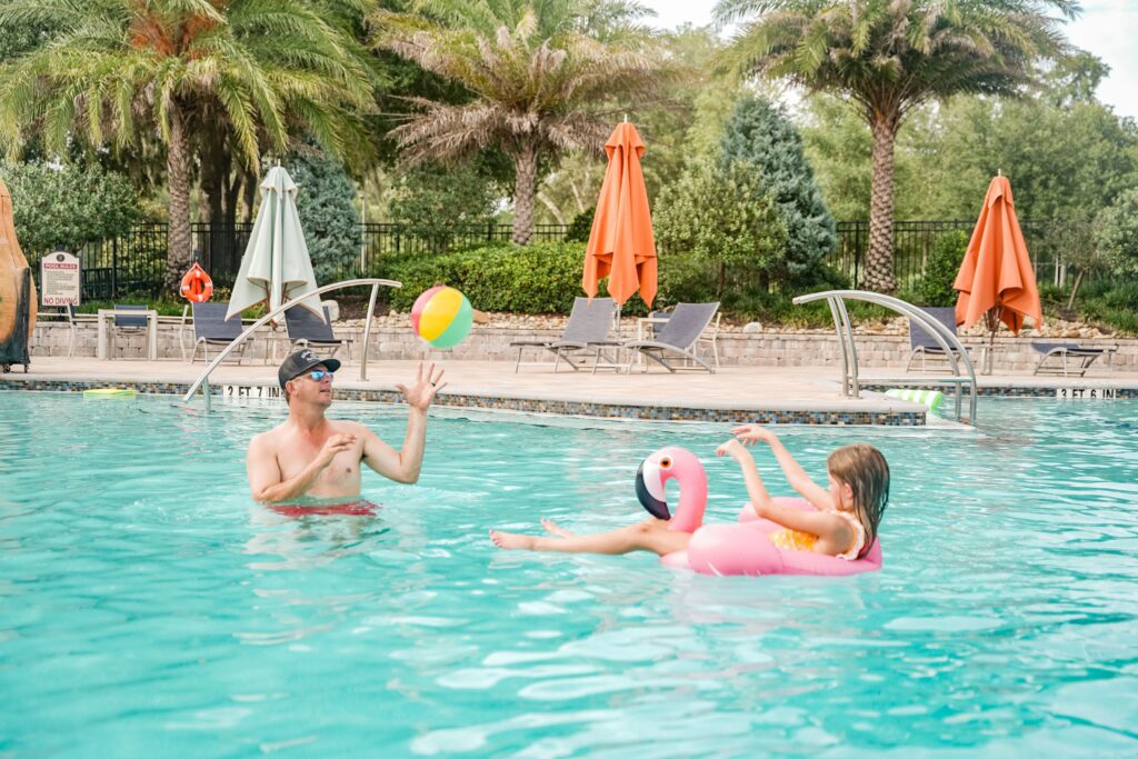 family playing in black prong pool