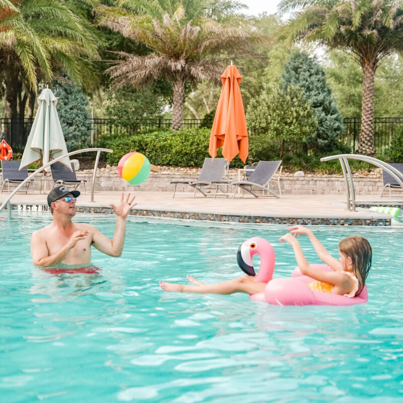 family playing in black prong pool