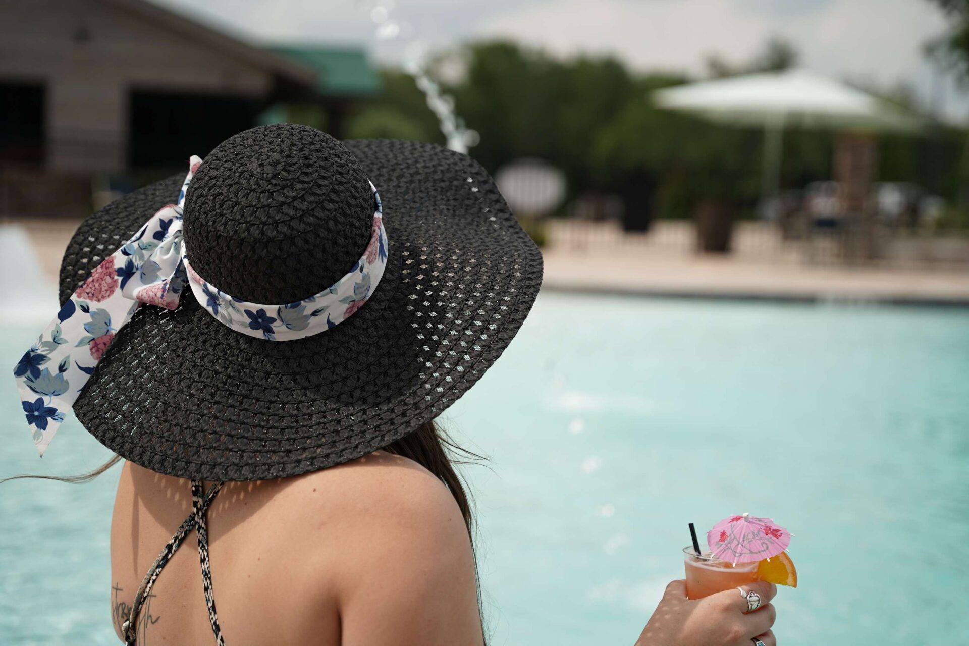 sip on a craft cocktail by the resort pool